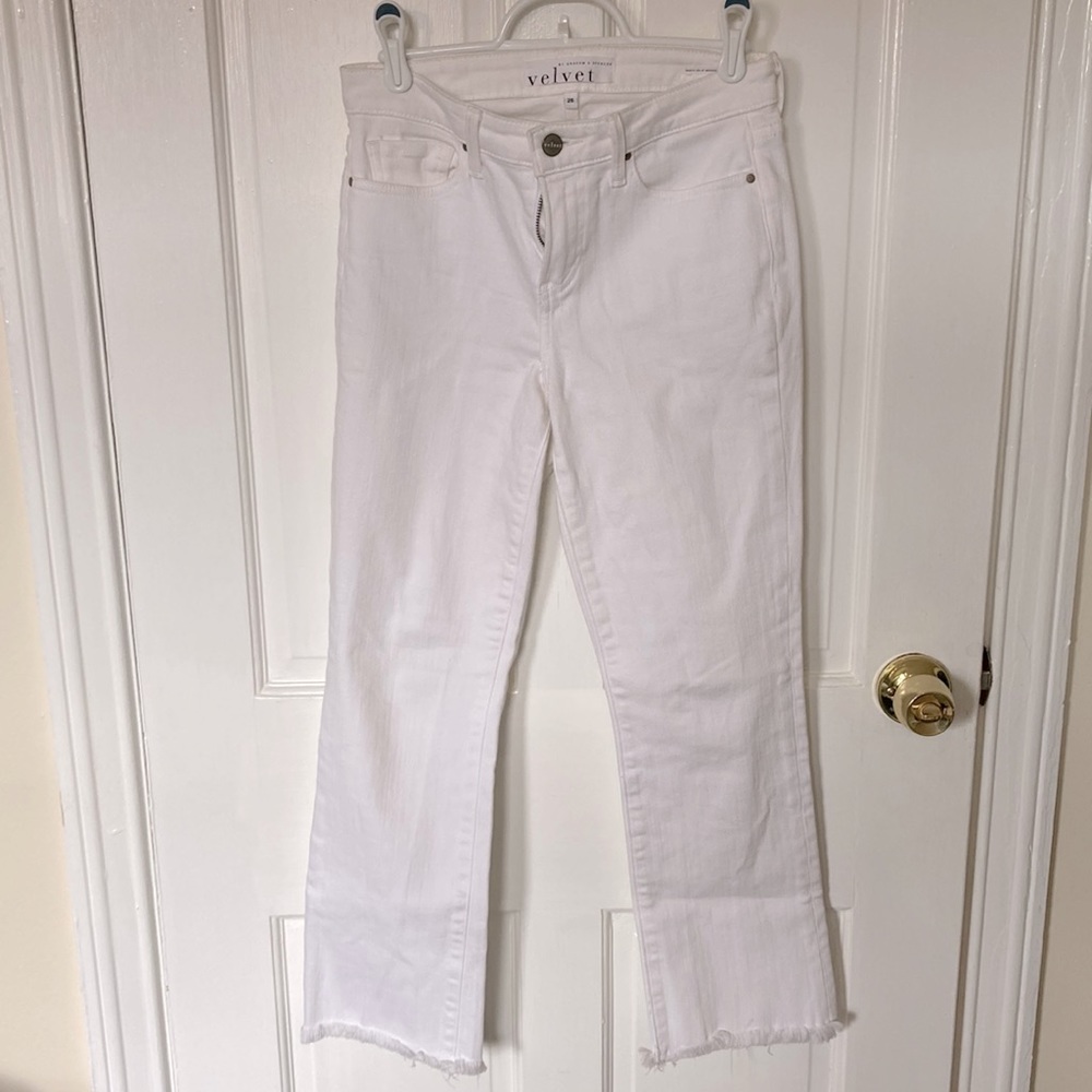 White jeans with fun fringe